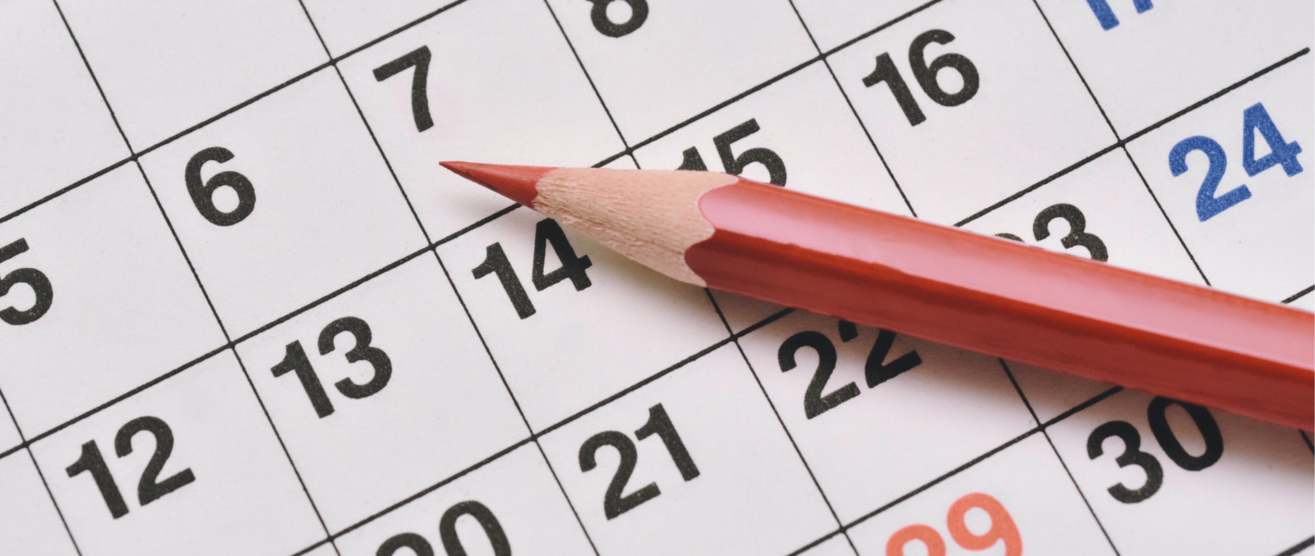 KI generiert: Ein Bleistift liegt auf einem Kalender.